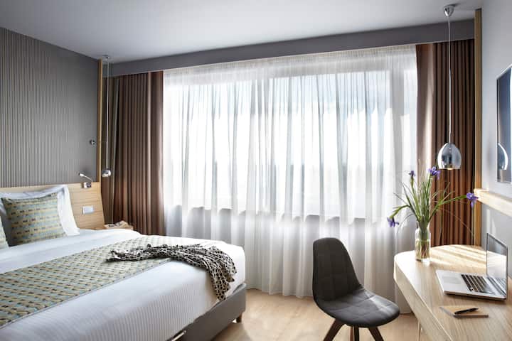 Guest room at the Wyndham Grand Athens in Athens, Other than US/Canada